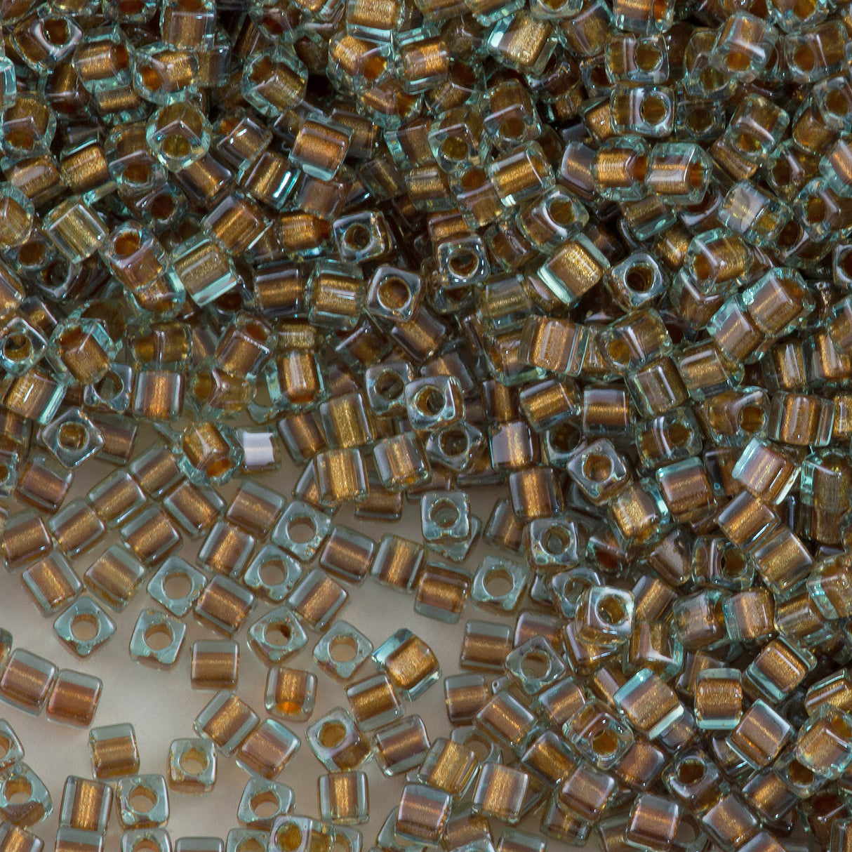 Miyuki 1.8mm Cube Seed Bead Aqua Inside Color Lined Bronze 8g Tube (2642)