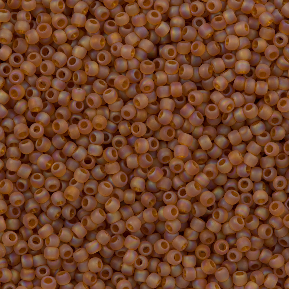 Toho Round Seed Bead 15/0 Transparent Matte Dark Amber AB 2.5-inch Tube (162CF)