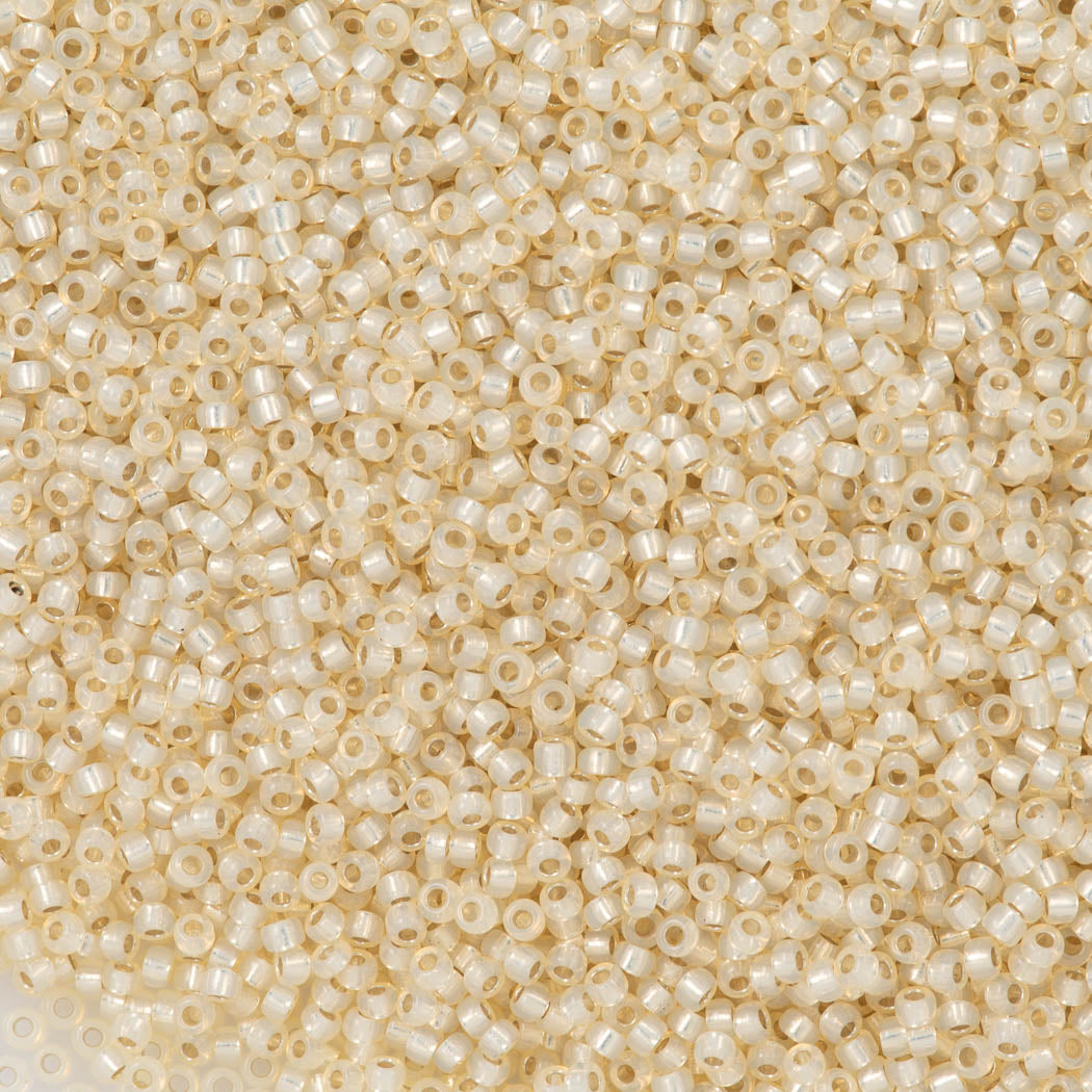 50g Miyuki Round Seed Bead 11/0 Silver Lined Dyed Cream (577)