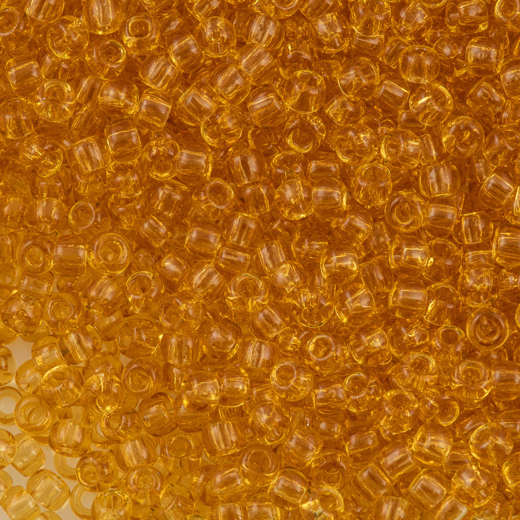 50g Toho Round Seed Beads 6/0 Transparent Amber (2)