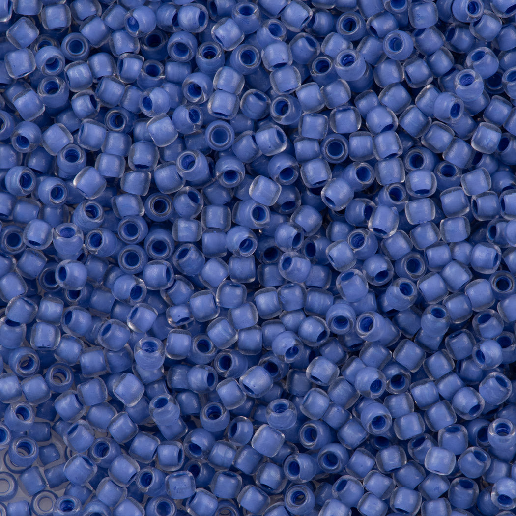 50g Toho Round Seed Bead 8/0 Inside Color Crystal Neon Purple Lined (977)