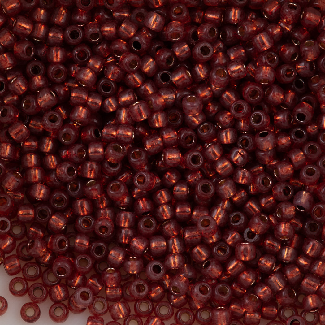 Toho Round Seed Bead 11/0 PermaFinish Silver Lined Milky Pomegranate (2113PF)