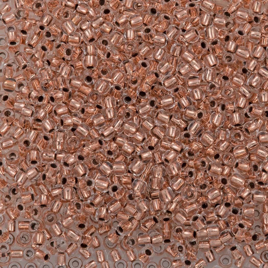 50g Toho Round Seed Beads 11/0 Copper Lined Crystal (740)