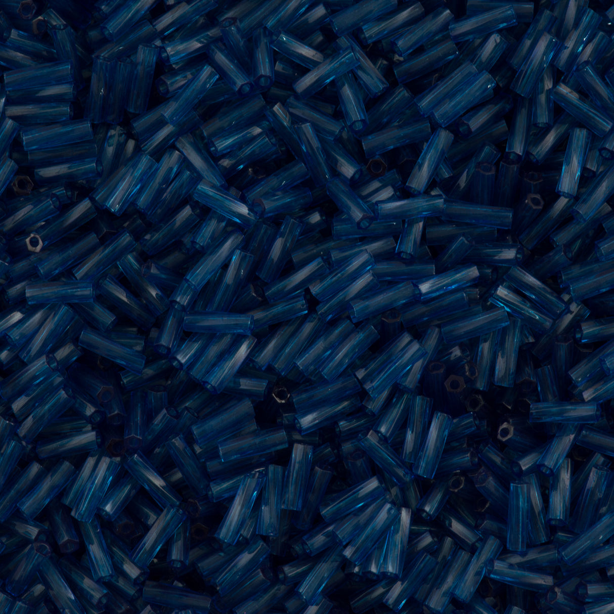 Miyuki 2x6mm Twisted Bugle Bead Transparent Dyed Montana Blue 25g (1710)