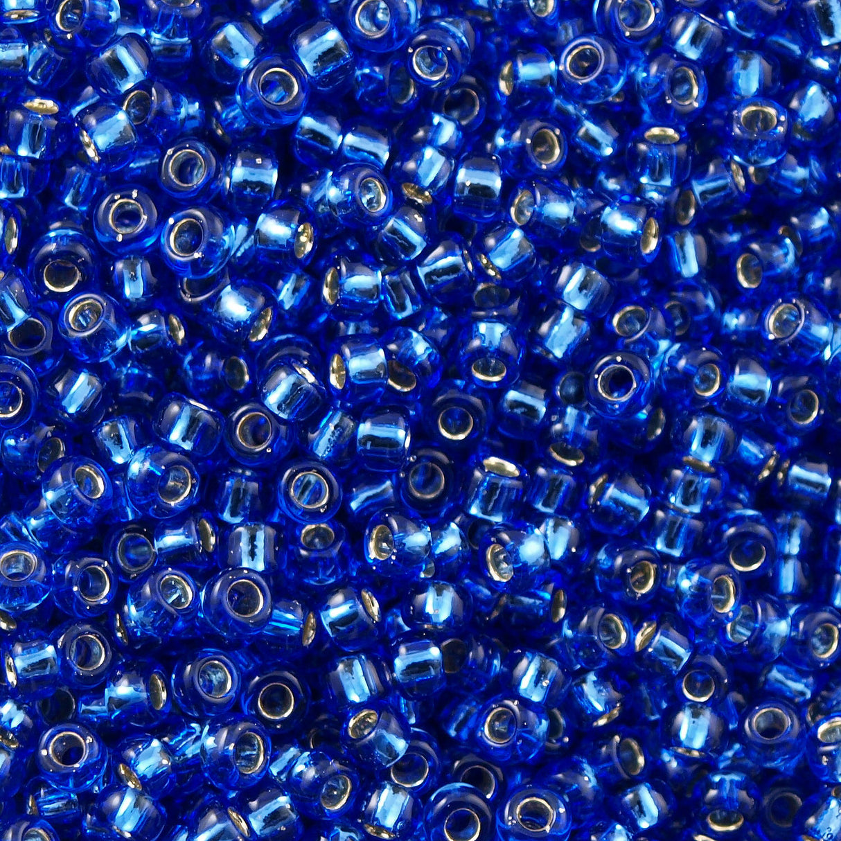 Toho Round Seed Beads 6/0 Silver Lined Montana Blue 2.5-inch tube (35)