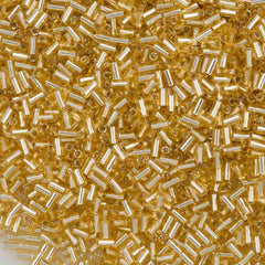 Toho 3mm Bugle Bead Transparent Silver Lined Gold (22)