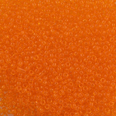 Toho Round Seed Bead 15/0 Transparent Medium Orange 2.5-inch Tube (10B)