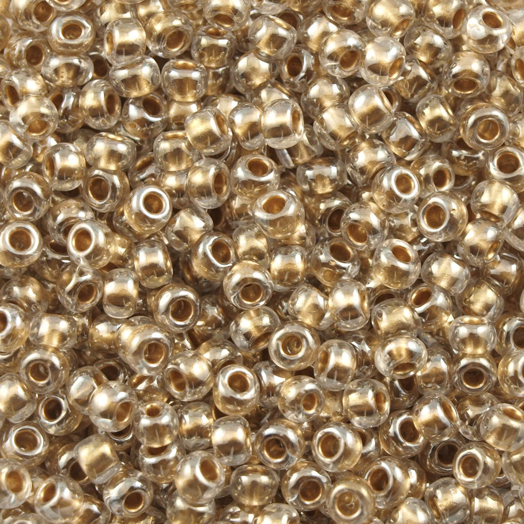 Toho Round Seed Bead 11/0 Inside Color Lined Gold (989)