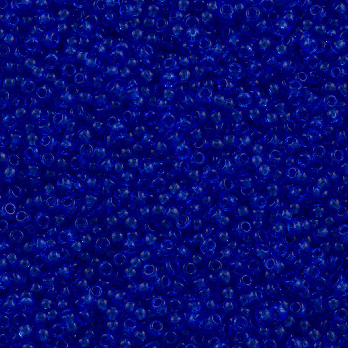 50g Toho Round Seed Beads 6/0 Transparent Sapphire (942)