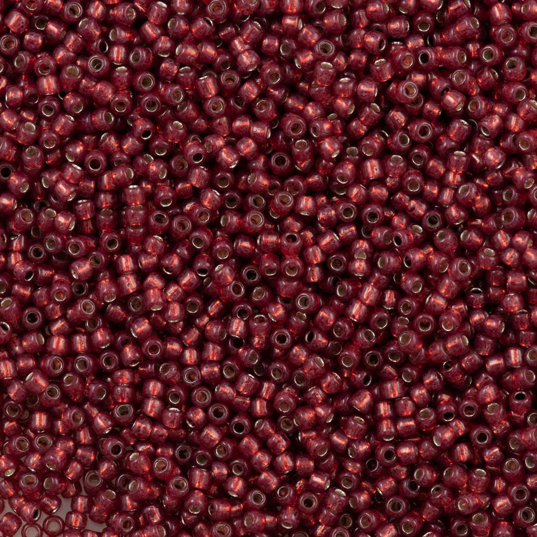 50g Toho Round Seed Bead 11/0 Silver Lined Milky Pomegranate (2113)