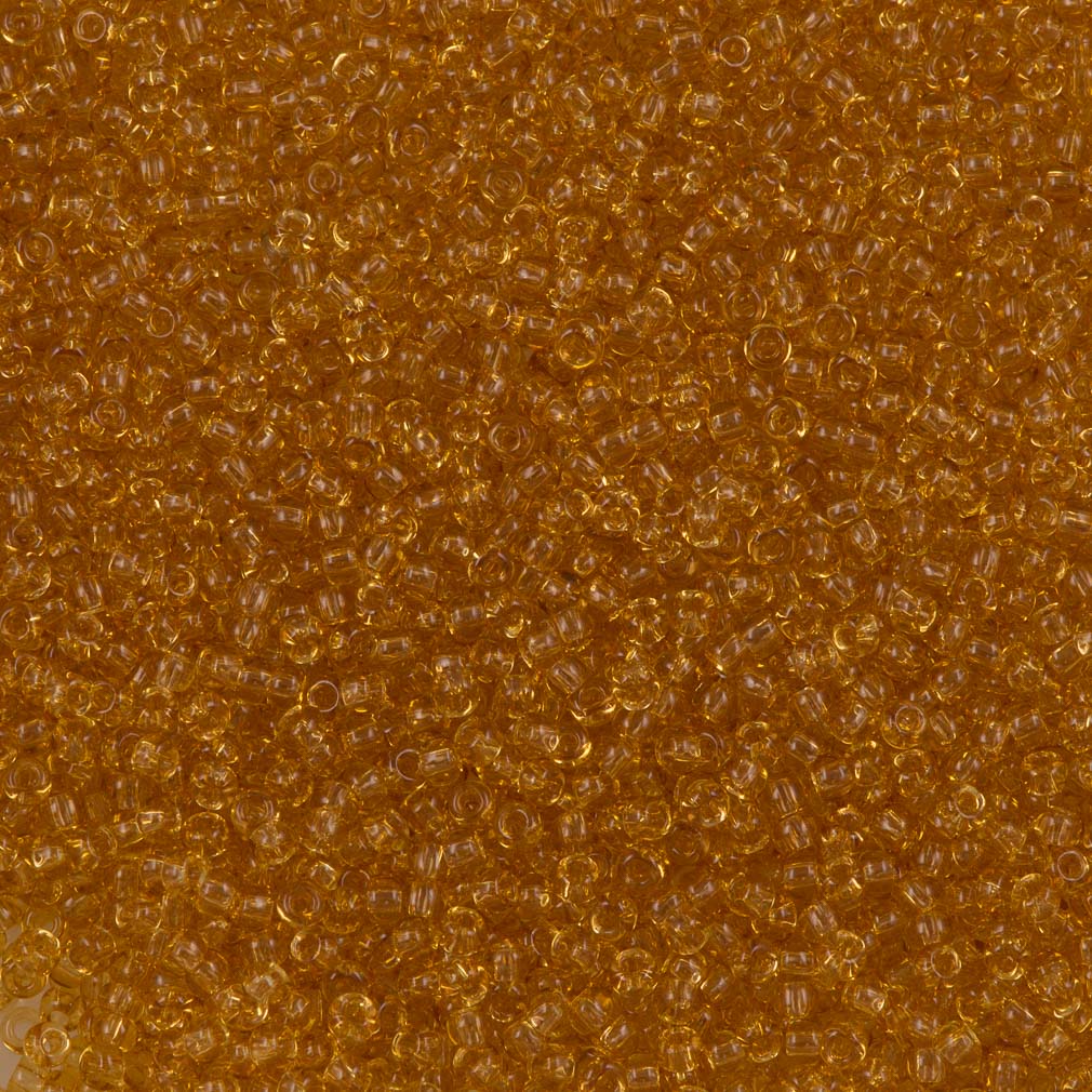 Toho Round Seed Bead 11/0 Transparent Light Topaz 19g Tube (622)