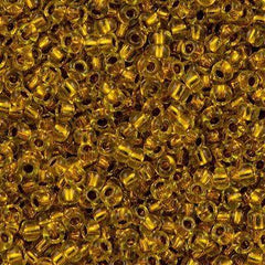 50g Toho Round Seed Beads 11/0 Copper Lined Marigold (745)