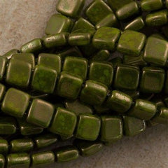 50 CzechMates 6mm Two Hole Tile Beads Opaque Olive Moon Dust (53420MD)