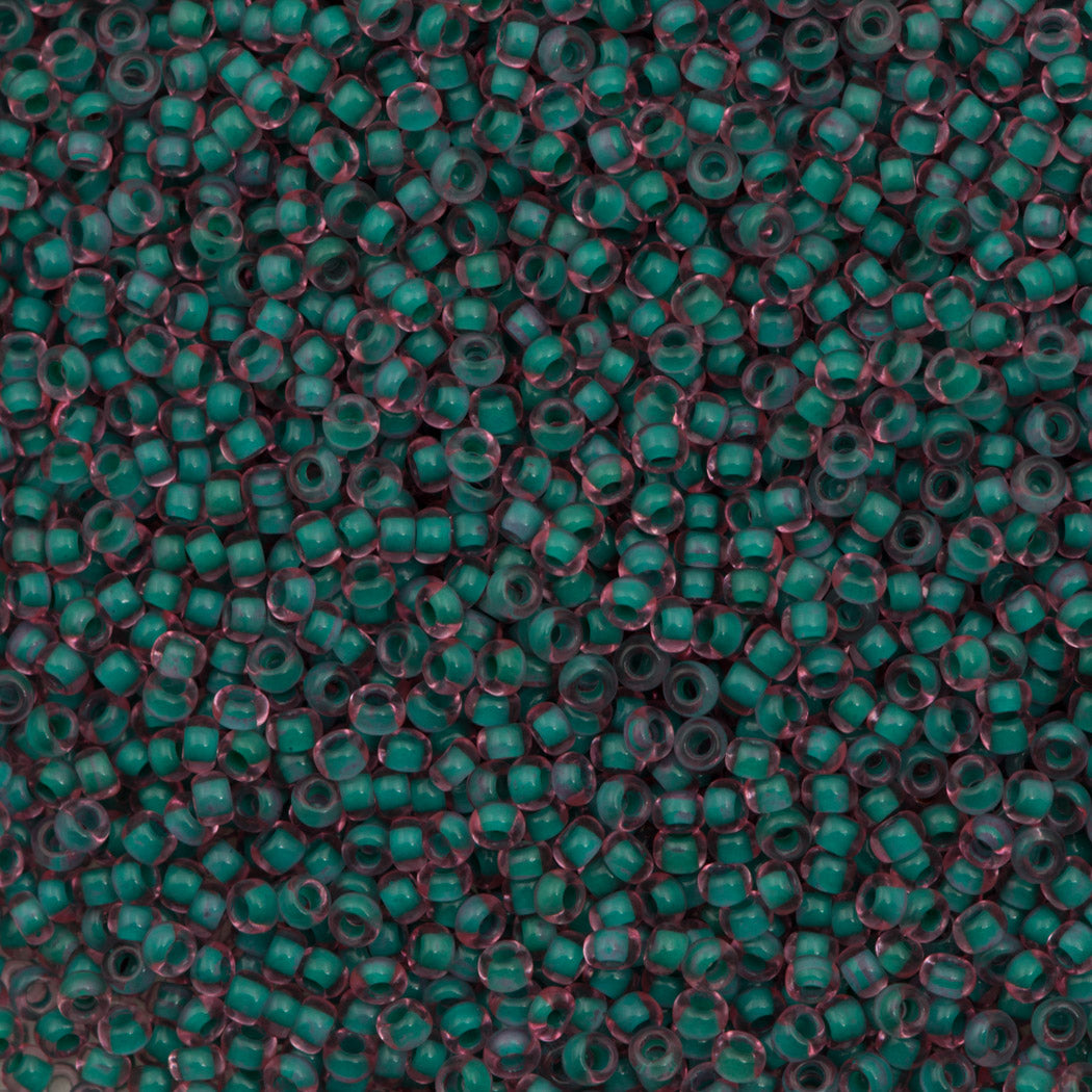 50g Czech Seed Bead 10/0 Pink Lined Terra Green (80958)