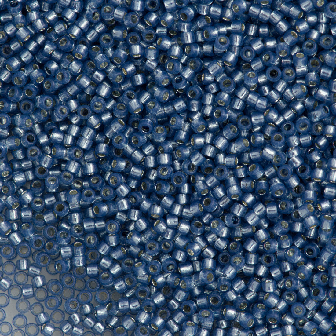 Toho Round Seed Bead 15/0 Silver Lined Milky Montana Blue 2.5-inch Tube (2102)