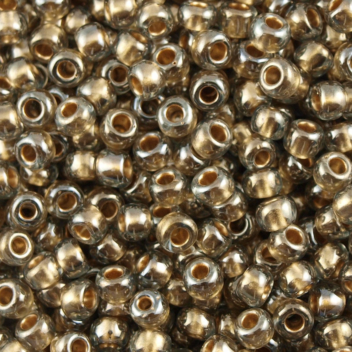 50g toho Round Seed Bead 8/0 Inside Color Lined Gold Soft Blue (993)