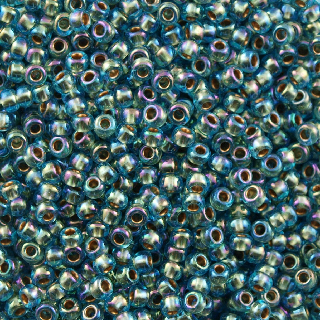 50g Toho Round Seed Beads 6/0 Inside Color Lined Gold Aqua AB (995)