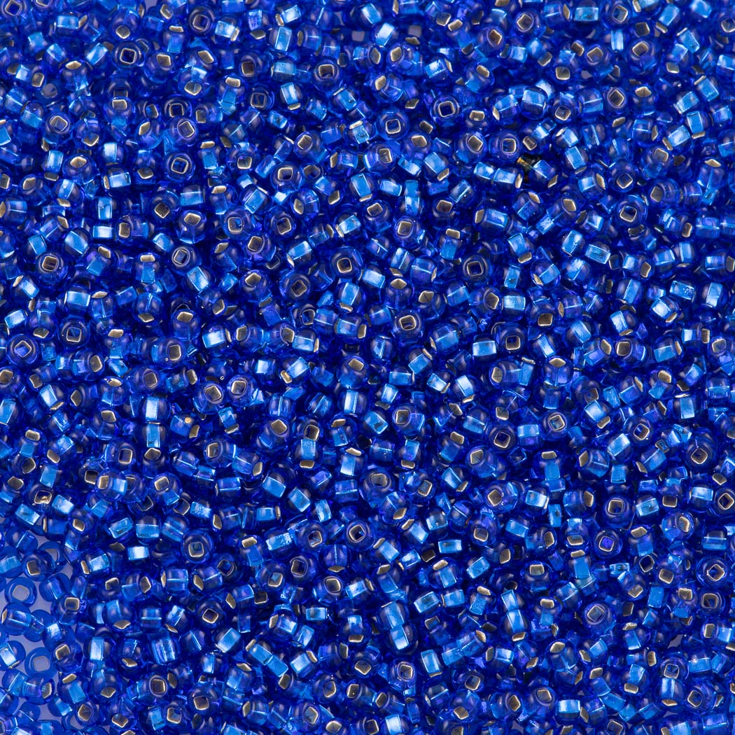 50g Czech Seed Bead 10/0 Silver Lined Sapphire (37050)
