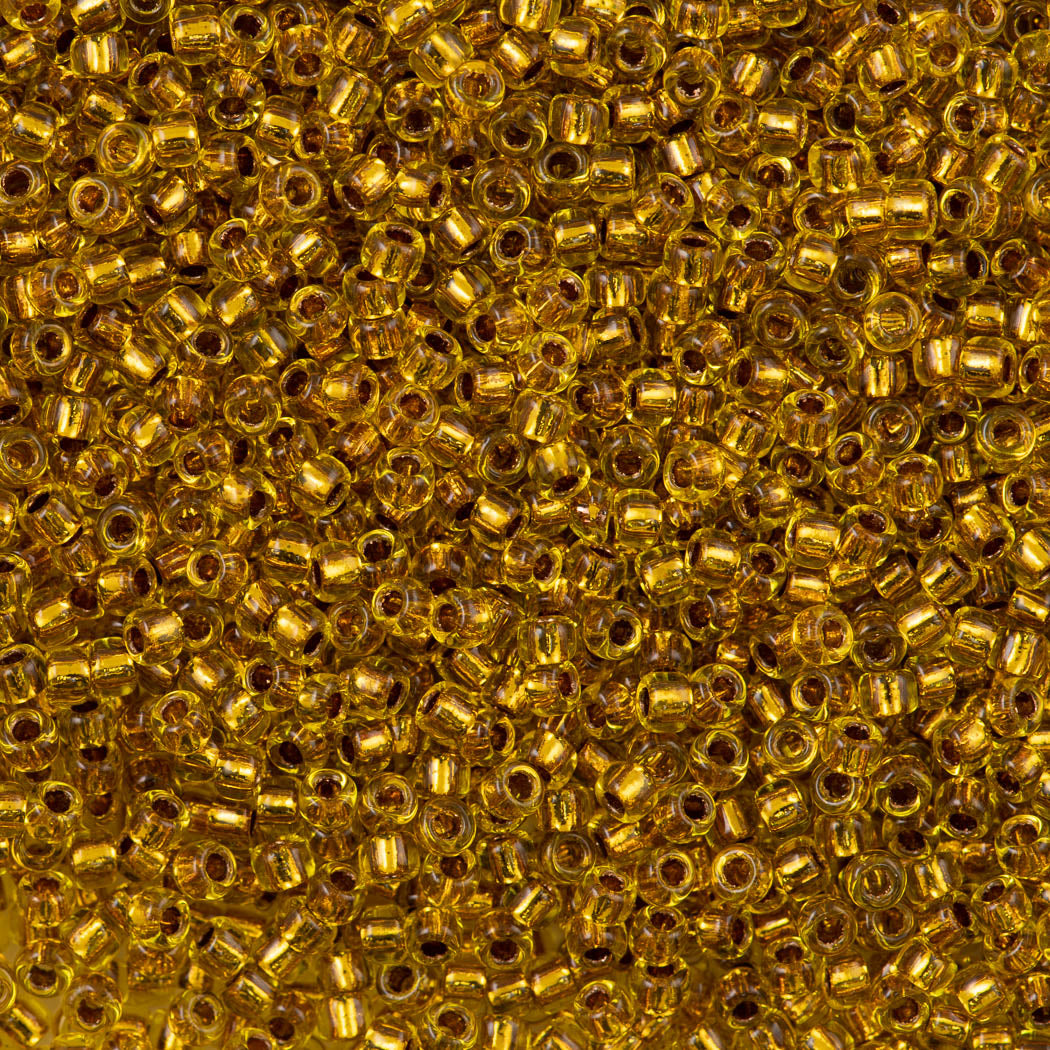 50g Toho Round Seed Bead 8/0 Copper Lined Marigold (745)