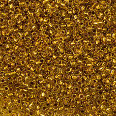 50g Toho Round Seed Bead 8/0 Copper Lined Marigold (745)