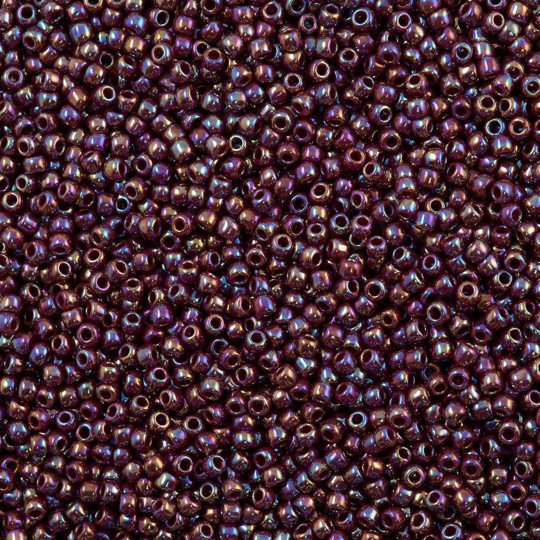 Toho Round Seed Bead 15/0 Opaque Plum AB (406)