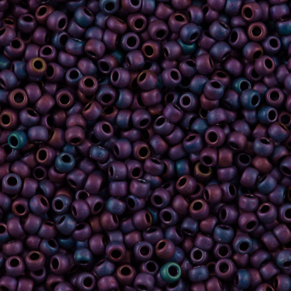 Toho Round Seed Bead 6/0 Matte Plum Iris 2.5-inch tube (704)