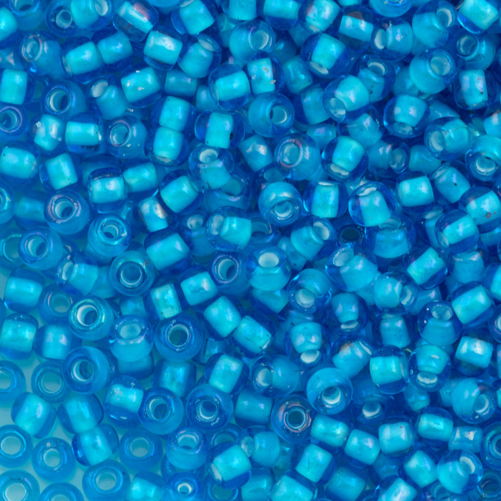 50g Toho Round Seed Bead 8/0 Inside Color Aqua White Lined (931)