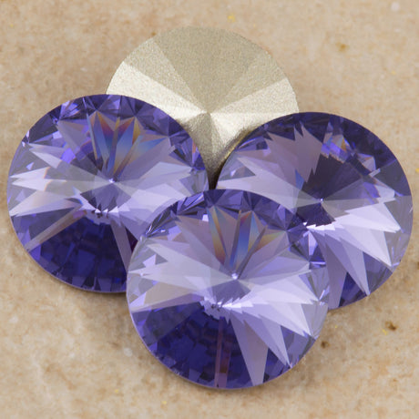 Four TRUE CRYSTAL 12mm Rivoli Tanzanite (539)