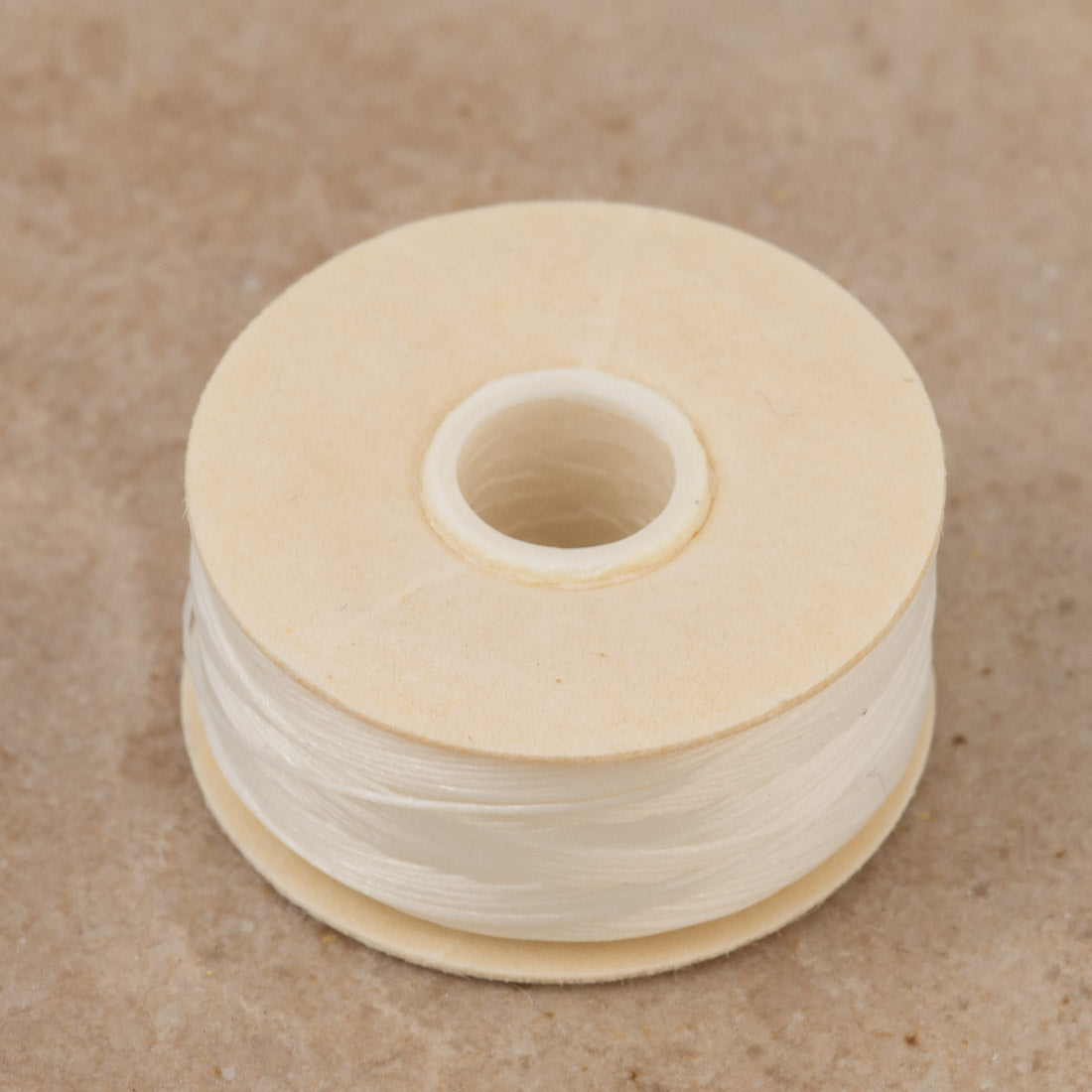 Size D Nymo Nylon White Thread bobbin