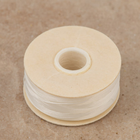Size D Nymo Nylon White Thread bobbin