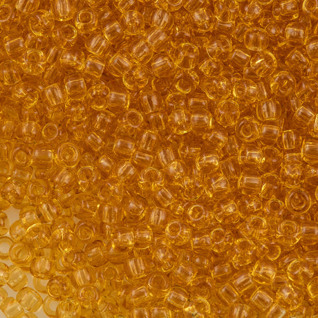 50g Toho Round Seed Beads 6/0 Transparent Amber (2)