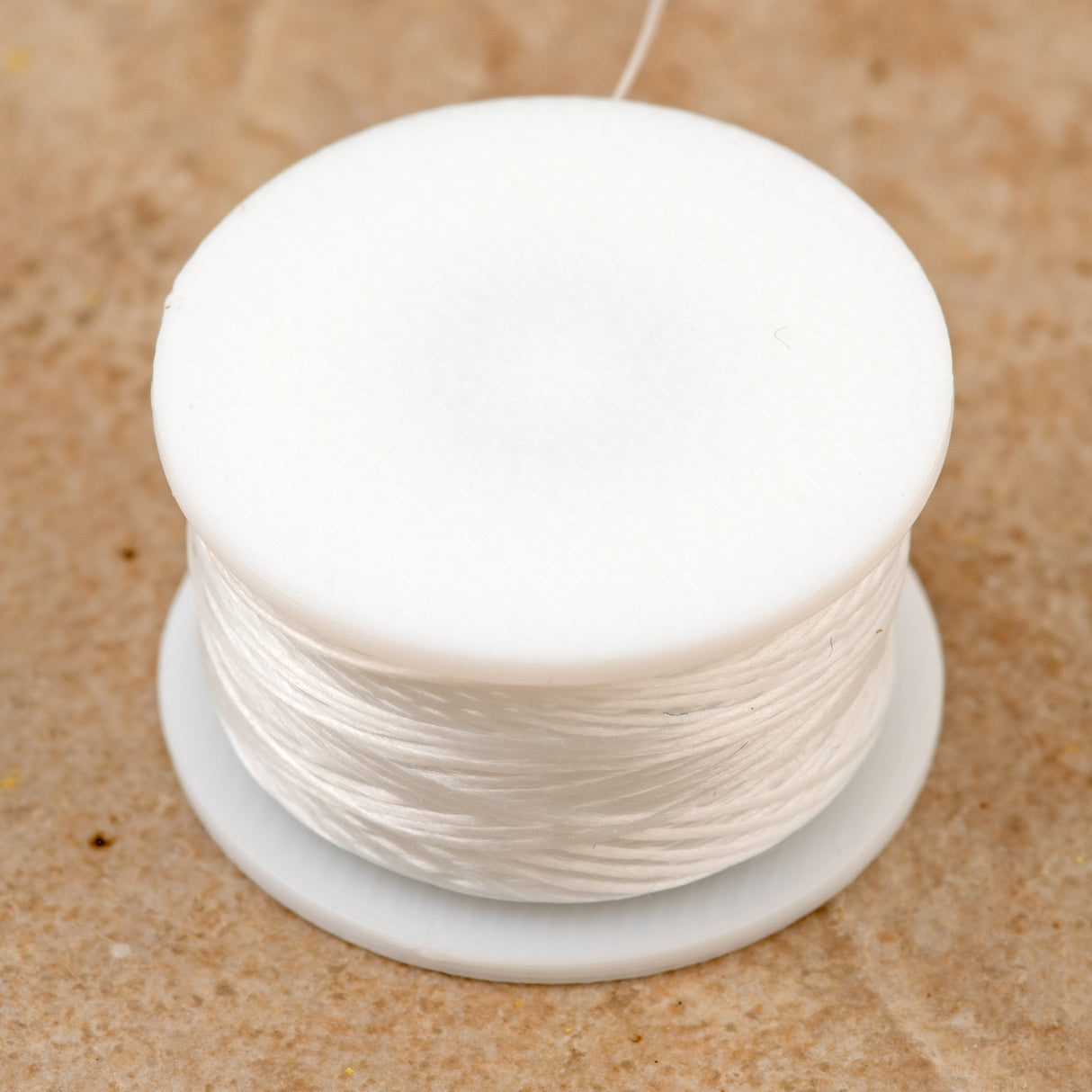 Size D Nymo Nylon White Thread 64 yard bobbin