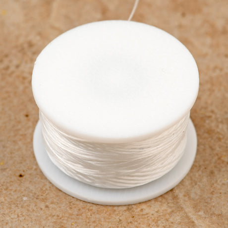 Size D Nymo Nylon White Thread 64 yard bobbin