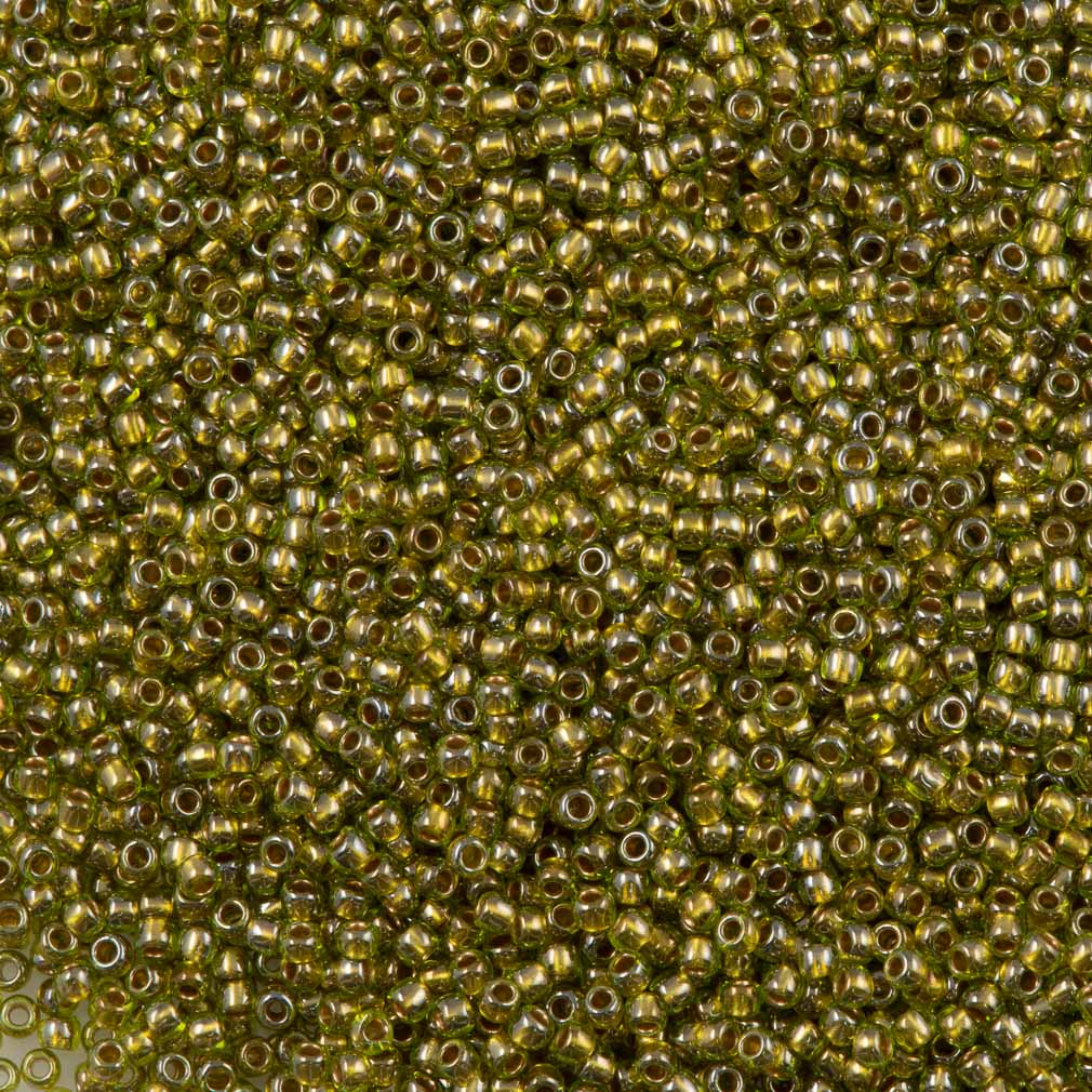 50g Toho Round Seed Bead 8/0 Gold Lined Peridot (991)