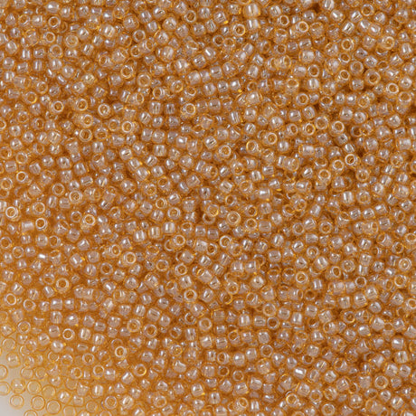 50g Toho Round Seed Bead 11/0 Transparent Light Topaz Luster (103)