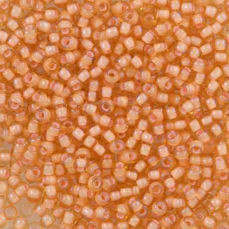 Toho Round Seed Bead 11/0 Light Topaz Inside Color Lined Peach (301)