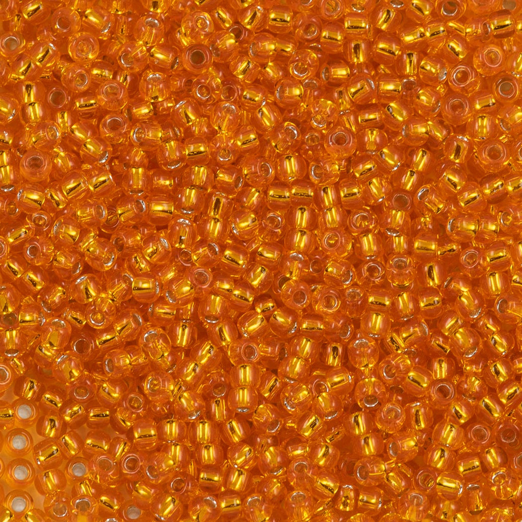 50g Toho Round Seed Bead 11/0 Silver Lined Tangerine (30B)