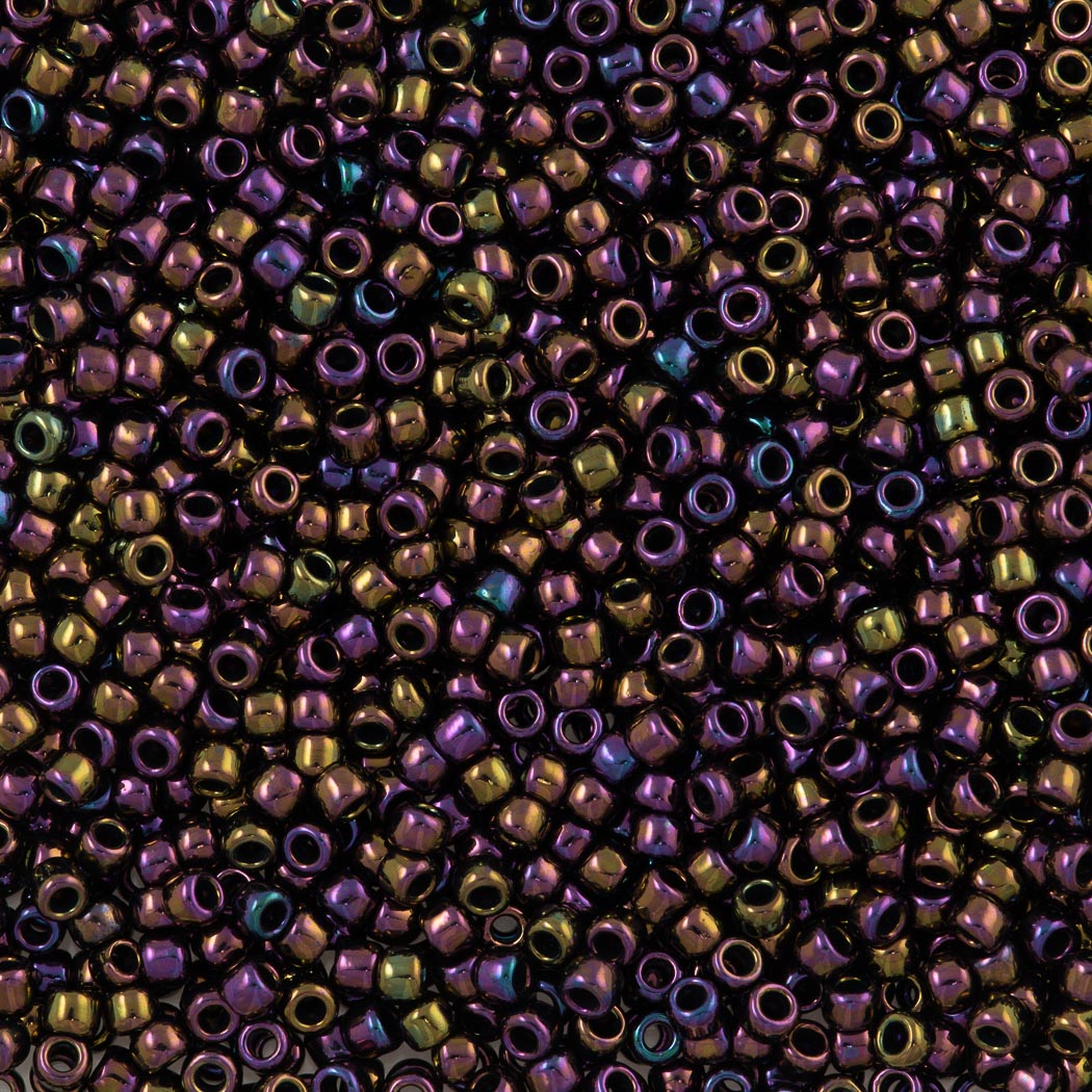 Toho Round Seed Bead 15/0 Metallic Plum Iris (85)