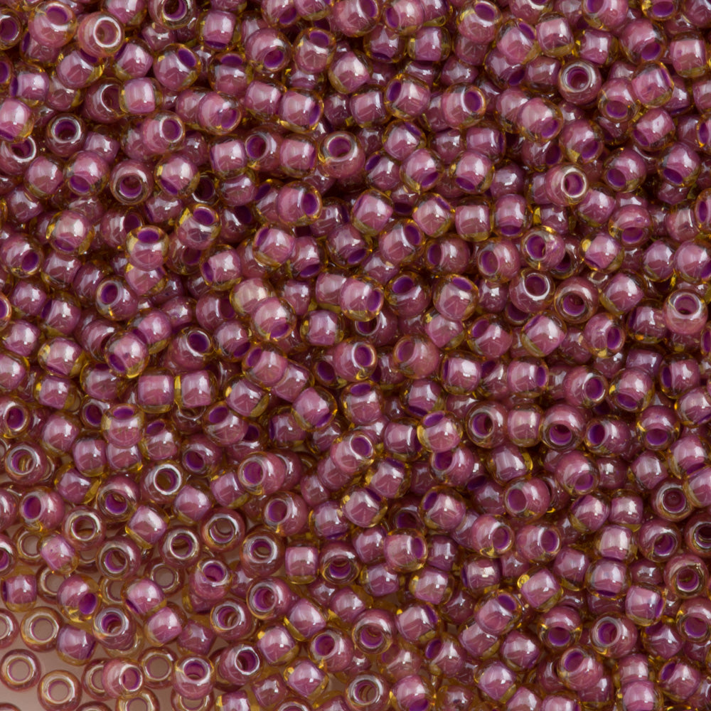 50g Toho Round Seed Beads 6/0 Inside Color Lined Dusty Mauve Amber (960)