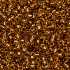 50g Toho Round Seed Bead 6/0 Copper Lined Light Topaz (744)