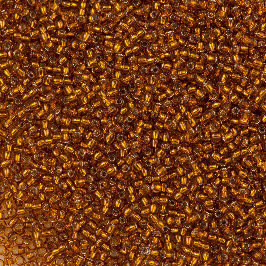 50g Toho Round Seed Beads 11/0 Silver Lined Marmalade (2154S)