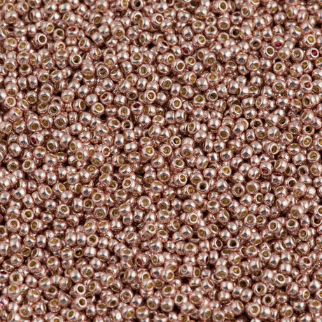 50g Toho Round Seed Bead 11/0 Permanent Finish Galvanized Peach Coral (552PF)
