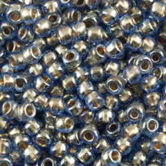 50g Toho Round Seed Beads 6/0 Inside Color Lined Gold Light Montana Blue (992)