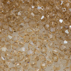 24 TRUE CRYSTAL 5mm Bicone Bead Crystal Golden Shadow (001 GSHA)