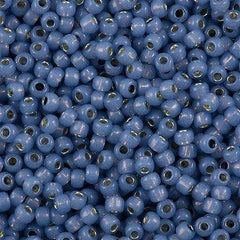 50g Toho Round Seed Bead 8/0 Silver Lined Milky Montana Blue (2102)