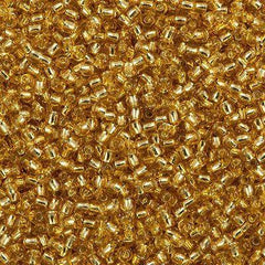 50g Toho Round Seed Beads 11/0 Silver Lined Medium Gold (22B)