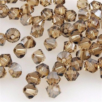 24 TRUE CRYSTAL 6mm Bicone Bead Light Colorado Topaz Satin (246 SAT)