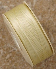 Size D Nymo Nylon Cream Thread 64 yard bobbin