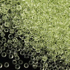 Toho Round Seed Beads 6/0 Transparent Soft Lime 2.5-inch tube (15)