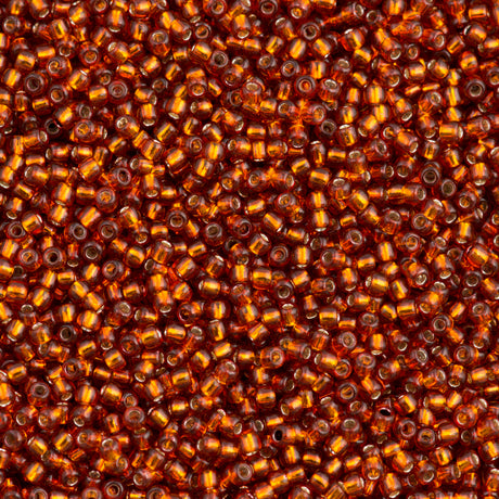 50g Toho Round Seed Bead 11/0 Silver Lined Burnt Orange (2208)